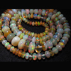 16 inches - Very Rare --Ethiopian Opal --Very Unique --Super Rare --Ethiopian Opal Smooth Rondells --FULL Strand --Super Rare Inside Fire --Very Rare Quality --Fire Opal --Size 2 --7mm Approx Approx